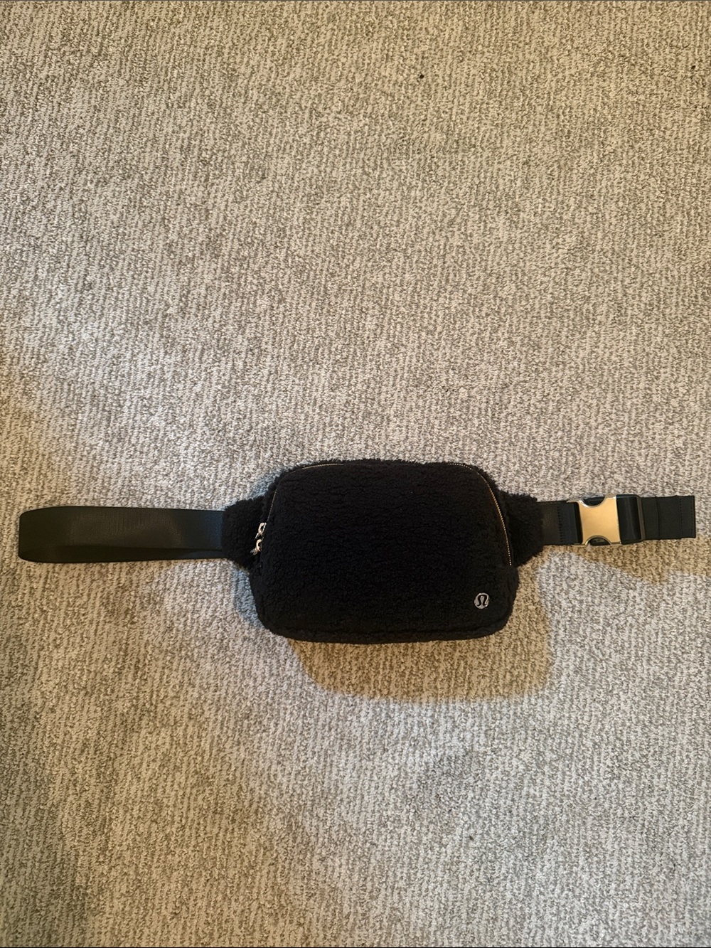 lululemon black sherpa waist pack with gold zipper